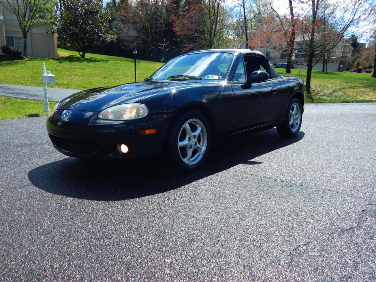 2002 Black /Black Cloth Mazda MX-5 Miata base (JM1NB353920) with an 1.8 liter 4 cylinder engine, 5 speed manual transmission, located at 6528 Lower York Road, New Hope, PA, 18938, (215) 862-9555, 40.358707, -74.977882 - Here for sale is a very fun 2002 Mazda MX-5 Miata. Under the hood is a strong running 1.8 liter 4 cylinder which puts power to the rear wheels via a solid shifting 5 speed manual transmission. Features include; Black cloth interior, wood grain trim, cold AC, power windows, AM/FM/CD, heated rear wi - Photo #0